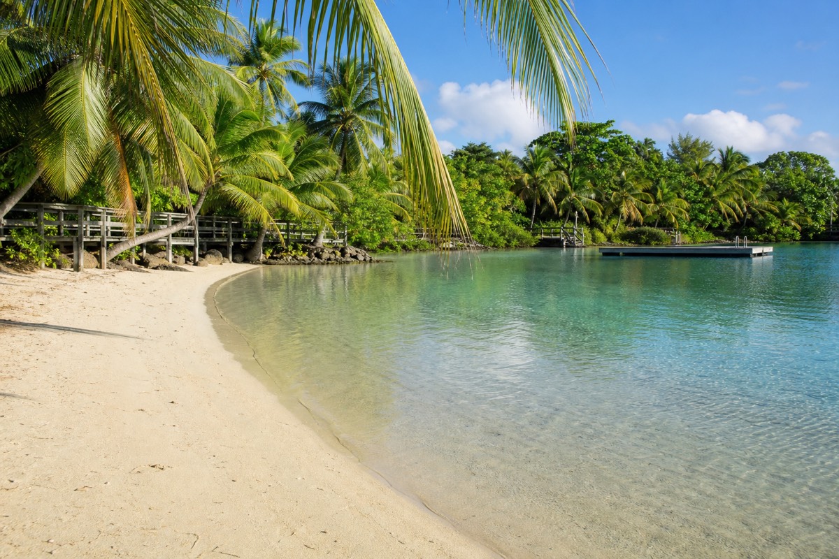 A quiet curve of beach on a private cay a short boat run from Nassau