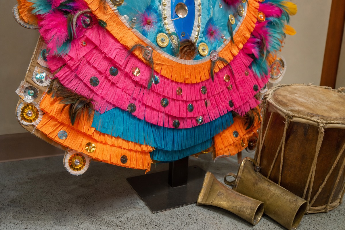 A Junkanoo costume and drums, the crepe-paper and cowbell tradition of Nassau