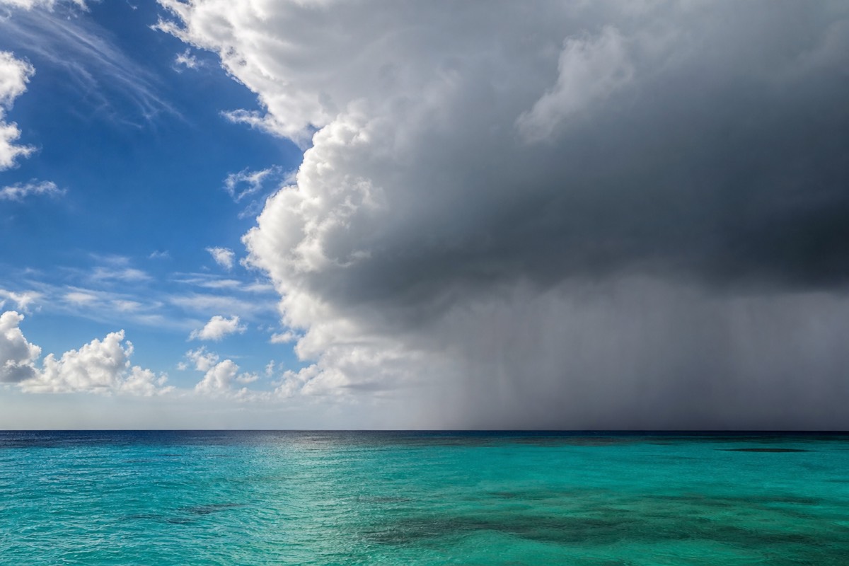 Dark squall clouds building over open sea near the Bahamas